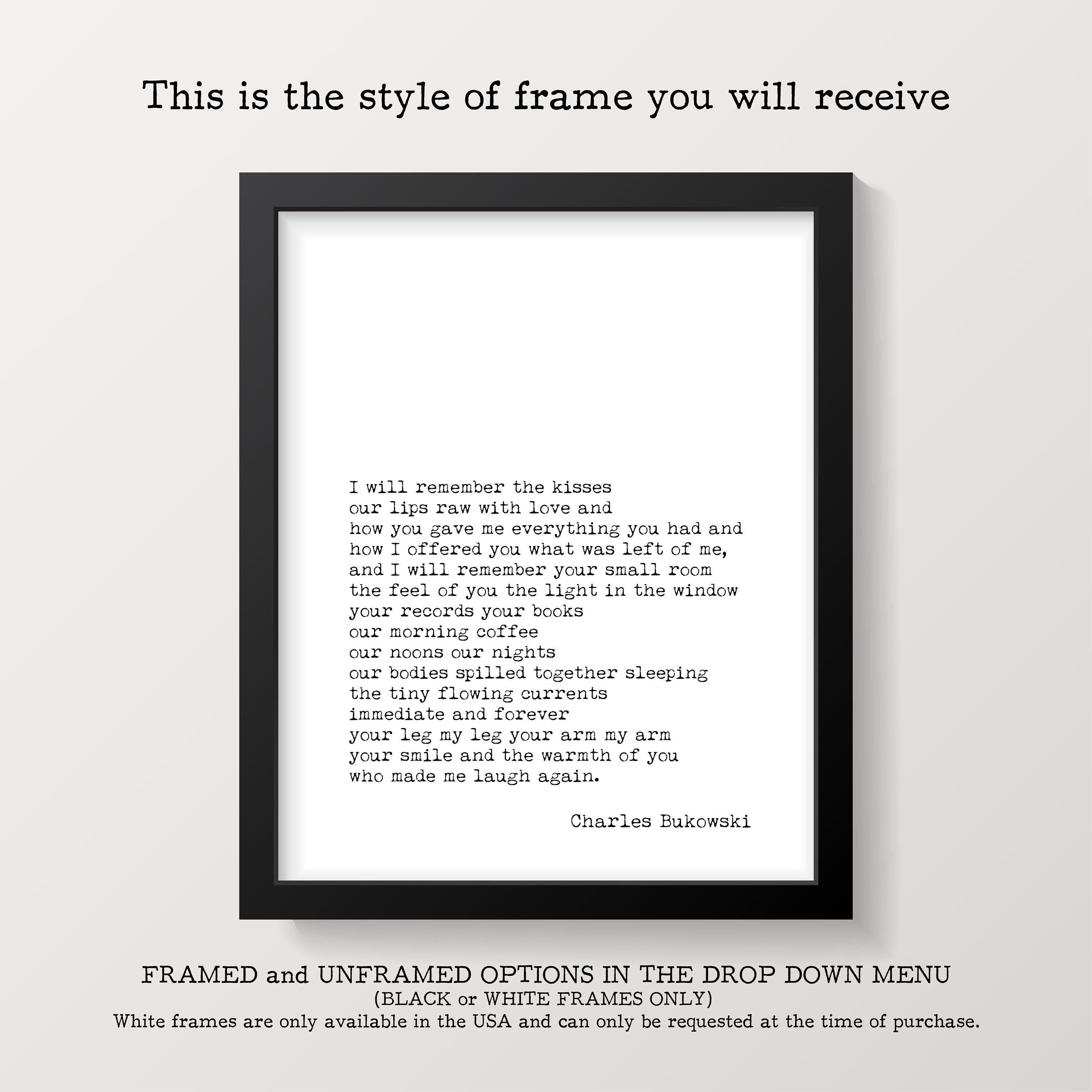A black framed print with white text of a poem titled "This is the style of frame you will receive" hangs on a white wall.