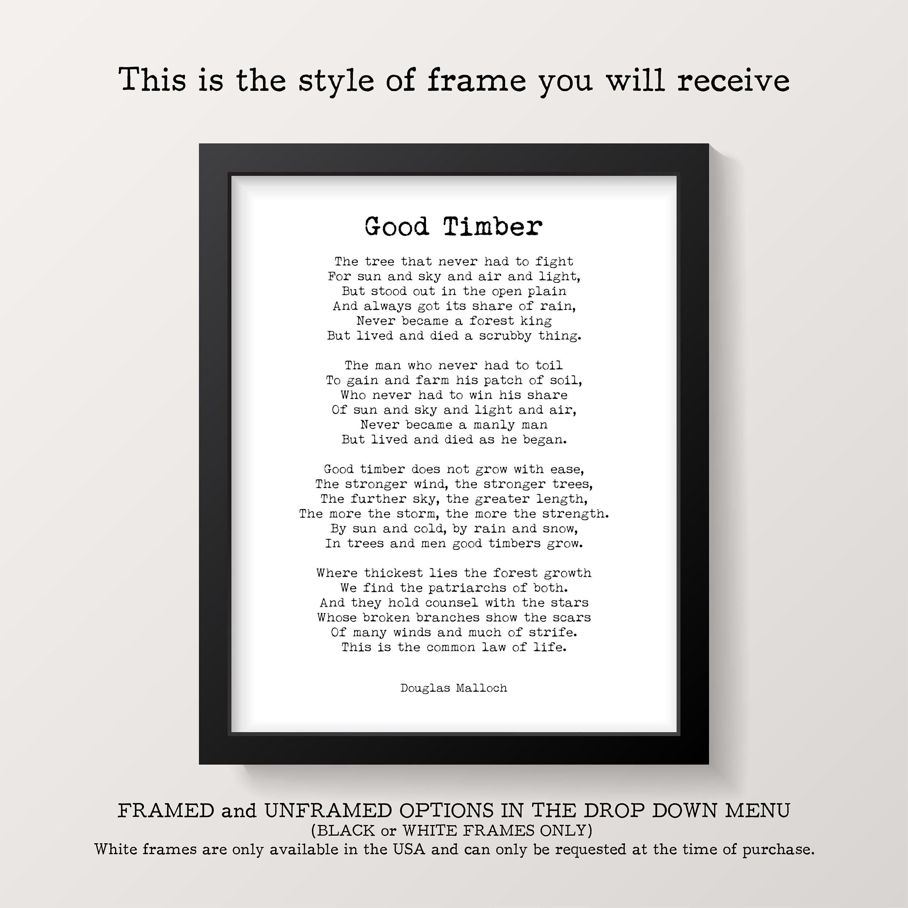 A framed print with a white background and black text of the poem "Good Timber" is centered on a light gray wall, with text above and below explaining framing options.
