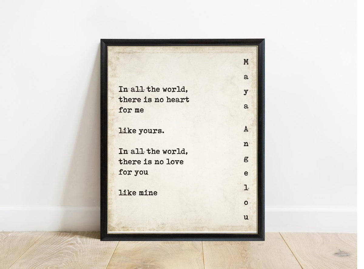 Maya Angelou In All the World quote print in a black frame, vintage background