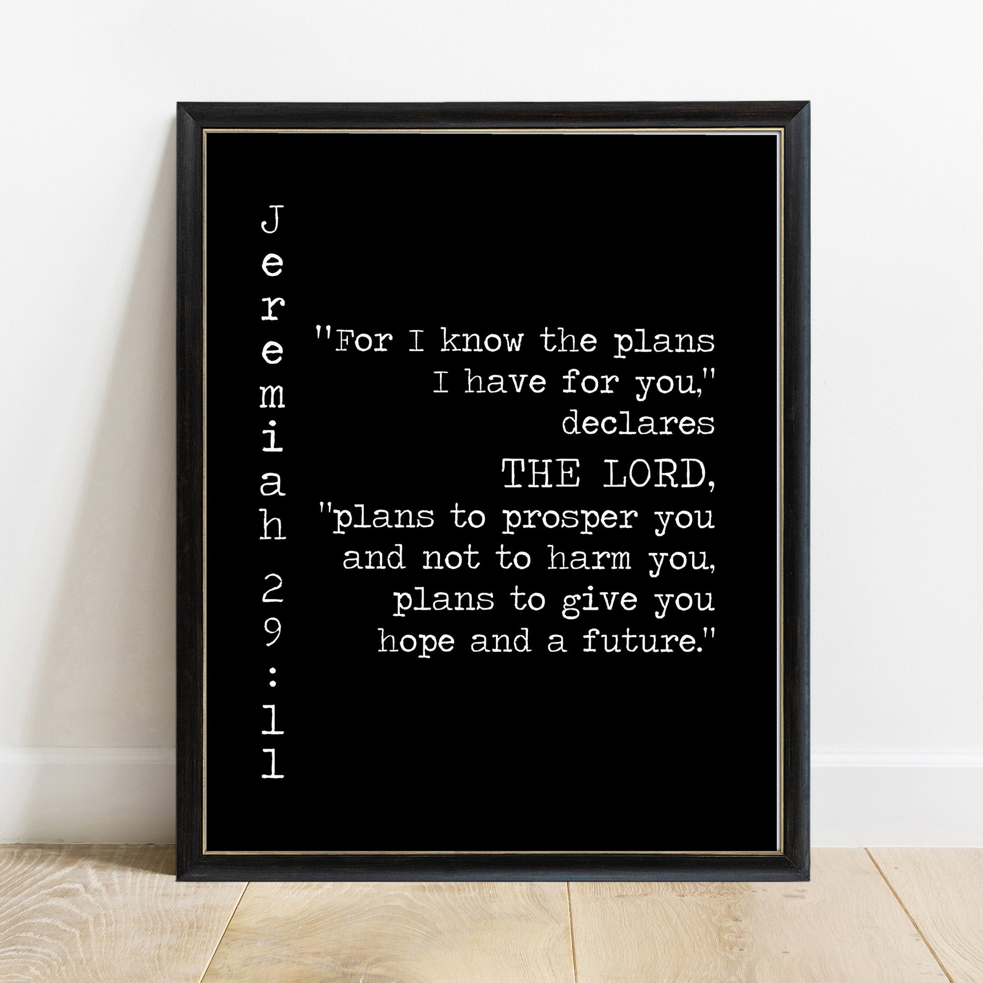 Jeremiah 29:11 plans to prosper you scripture print in a black frame, black background