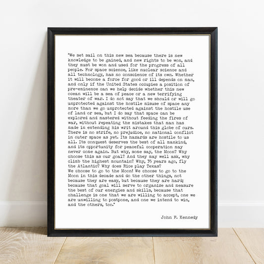 JFK we choose to go to the moon speech print in a black frame, white background