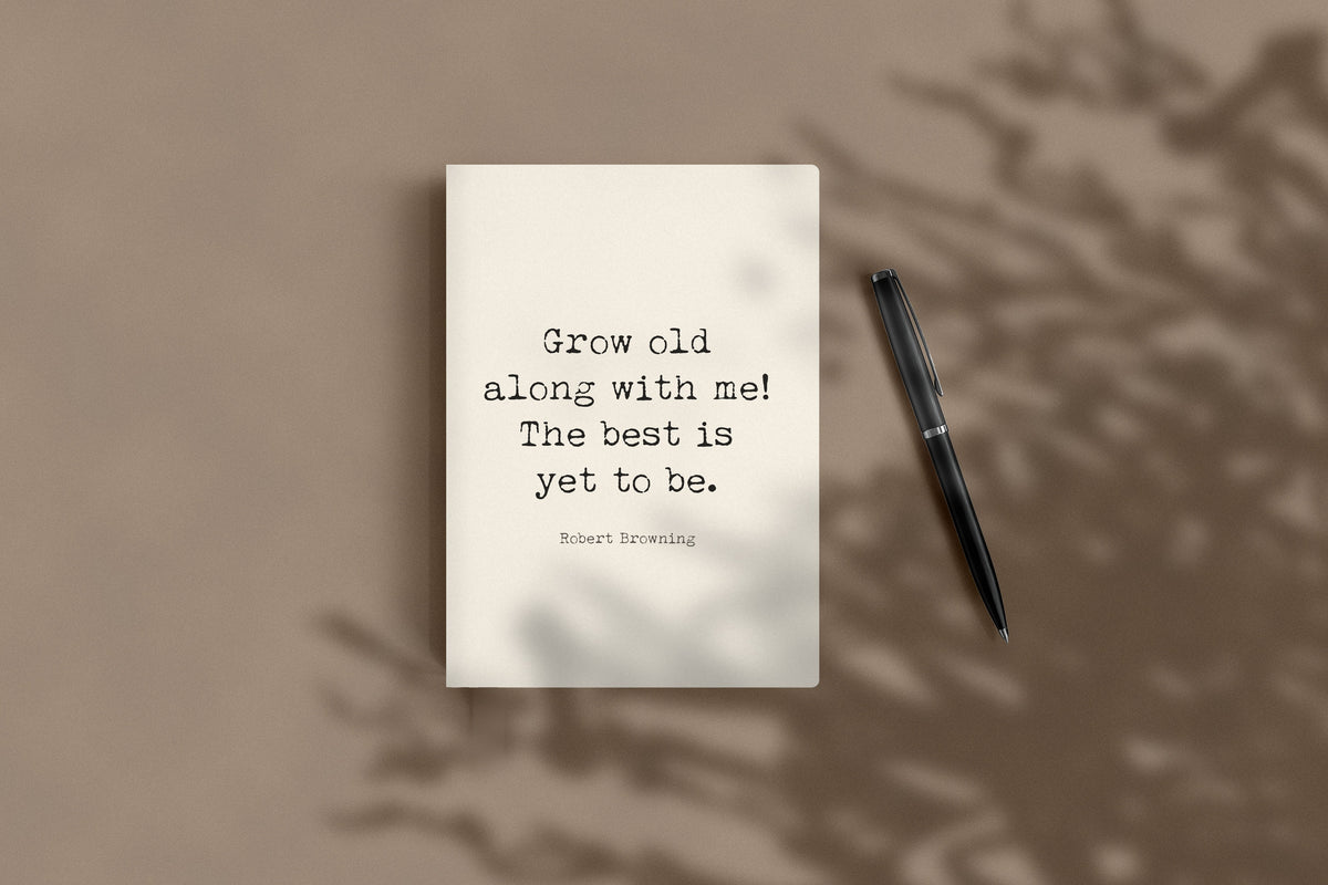 Robert Browning Grow old along with me journal lying flat beside a black pen