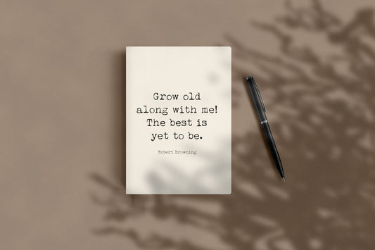 Robert Browning Grow old along with me journal lying flat beside a black pen
