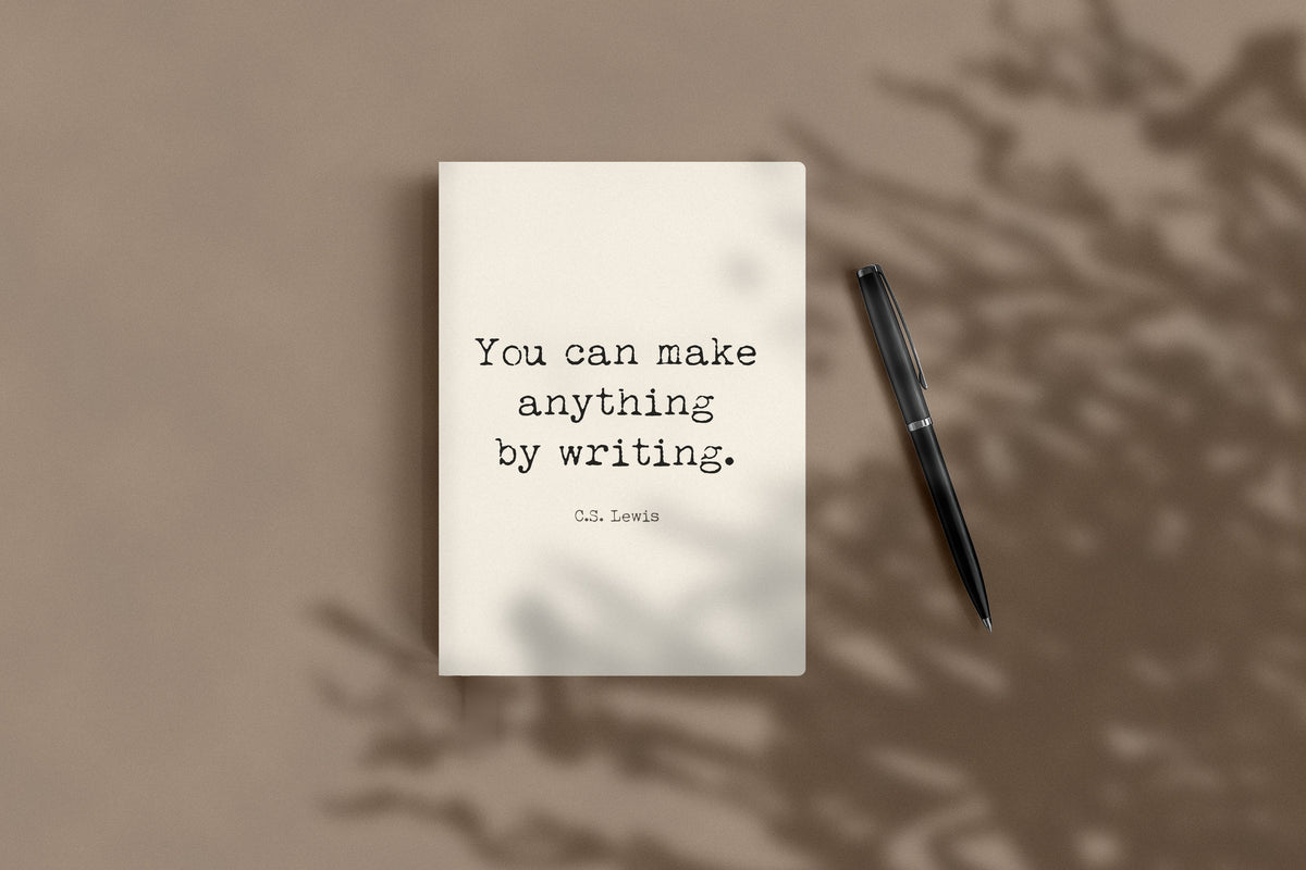 C.S. Lewis You can make anything by writing journal lying flat beside a black pen