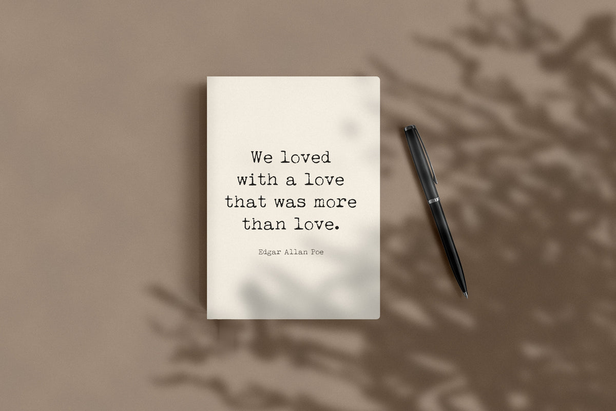 Edgar Allan Poe We loved with a love journal lying flat beside a black pen