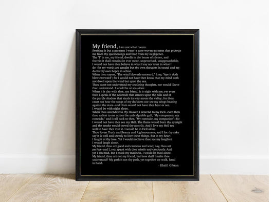 Kahlil Gibran My Friend poem print in a black frame, black background