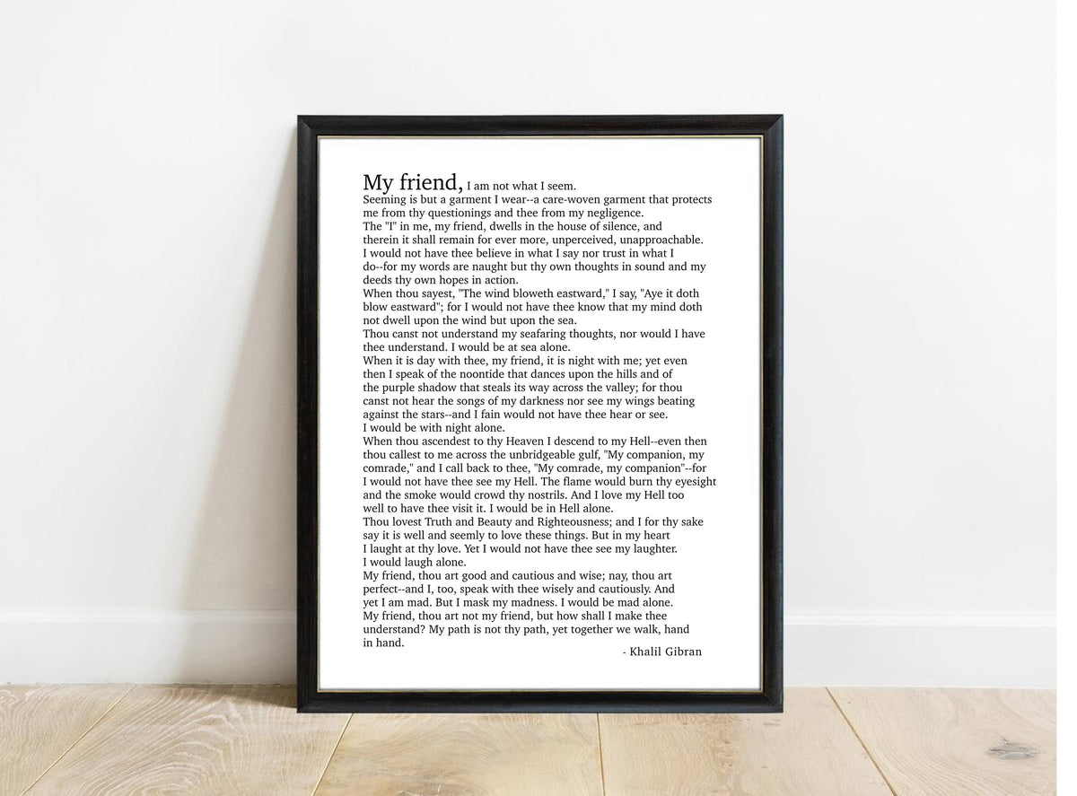 Kahlil Gibran My Friend poem print in a black frame, white background