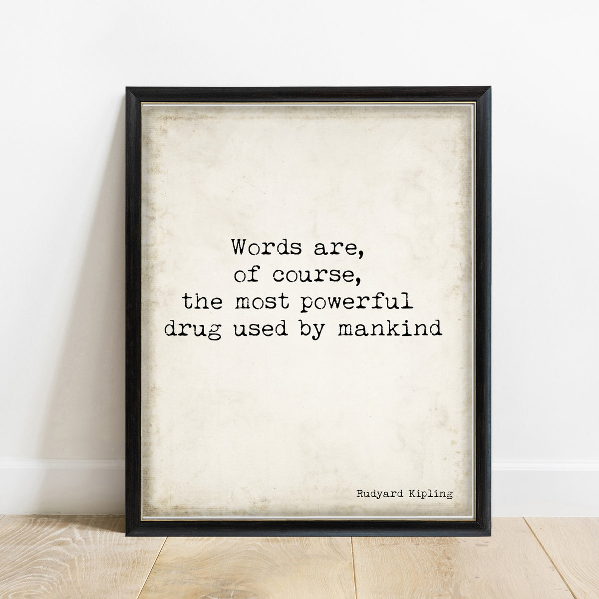 Rudyard Kipling words are the most powerful drug quote print in a black frame, vintage background