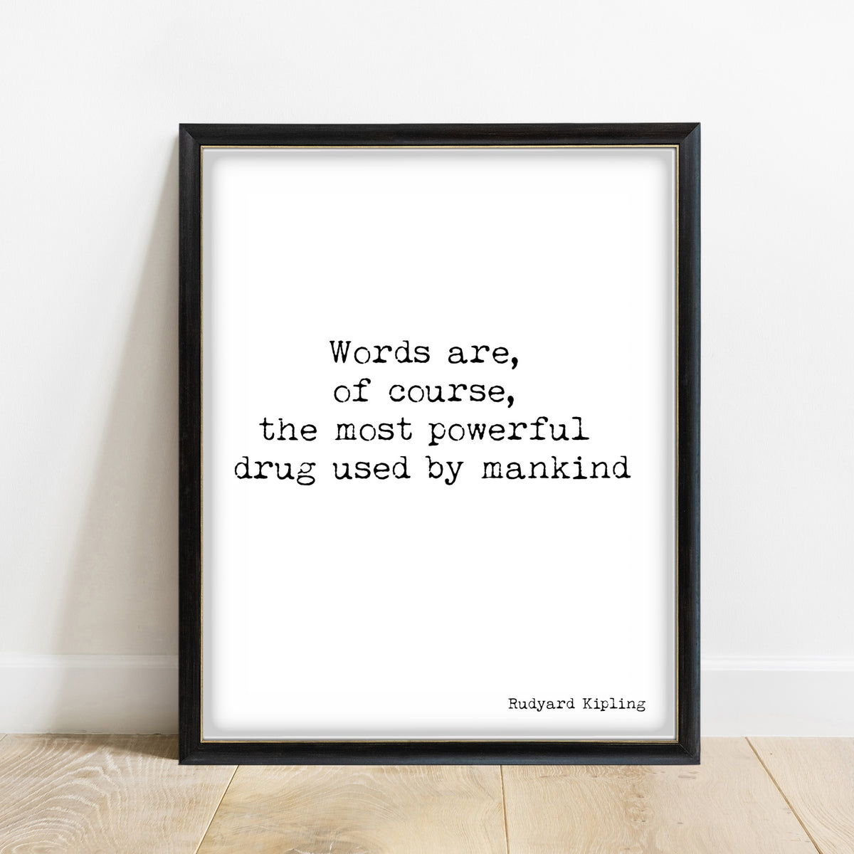 Rudyard Kipling words are the most powerful drug quote print in a black frame, white background