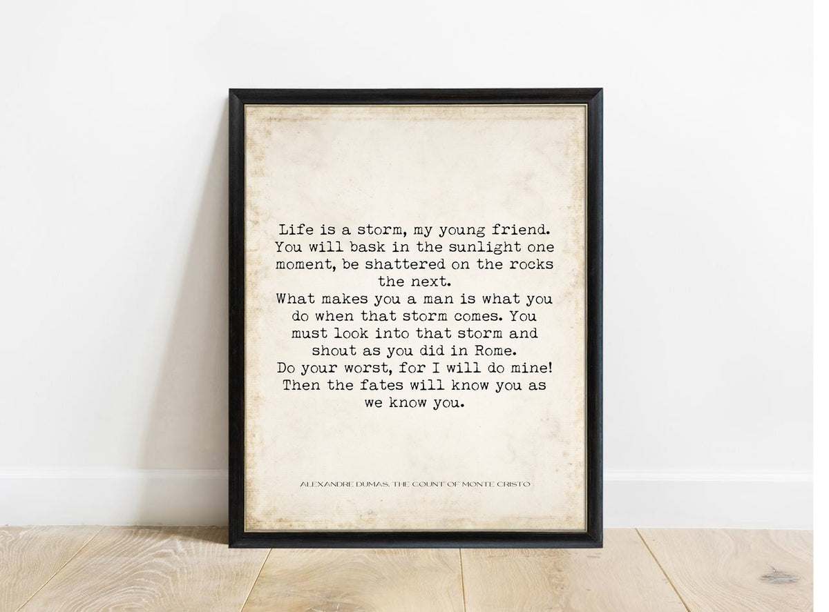 Alexandre Dumas Life Is a Storm quote print in a black frame, vintage background