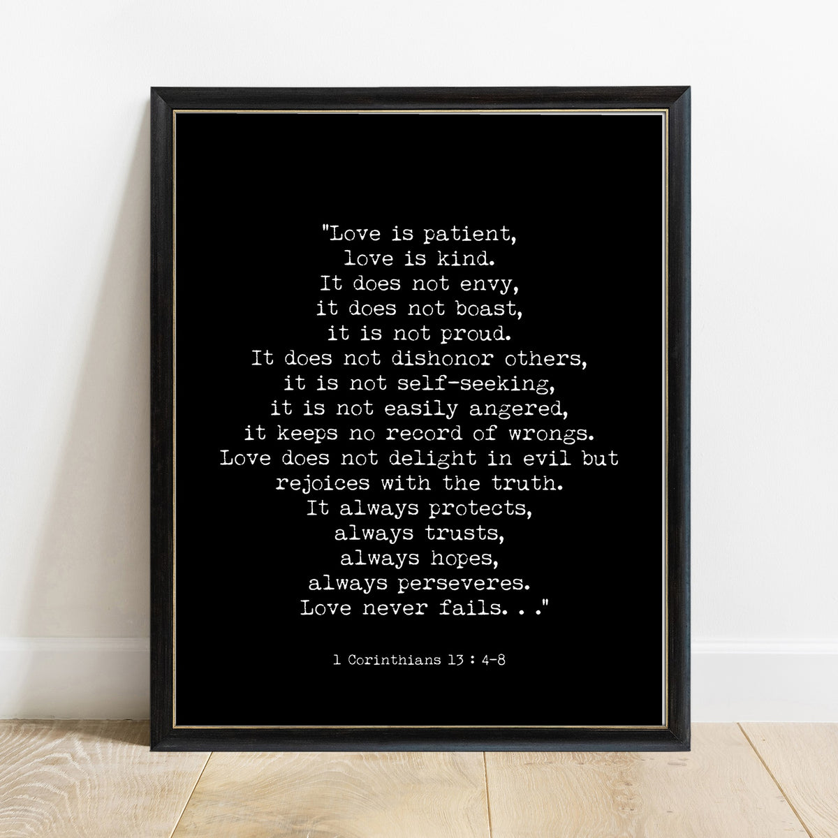 1 Corinthians 13 love is patient scripture print in a black frame, black background