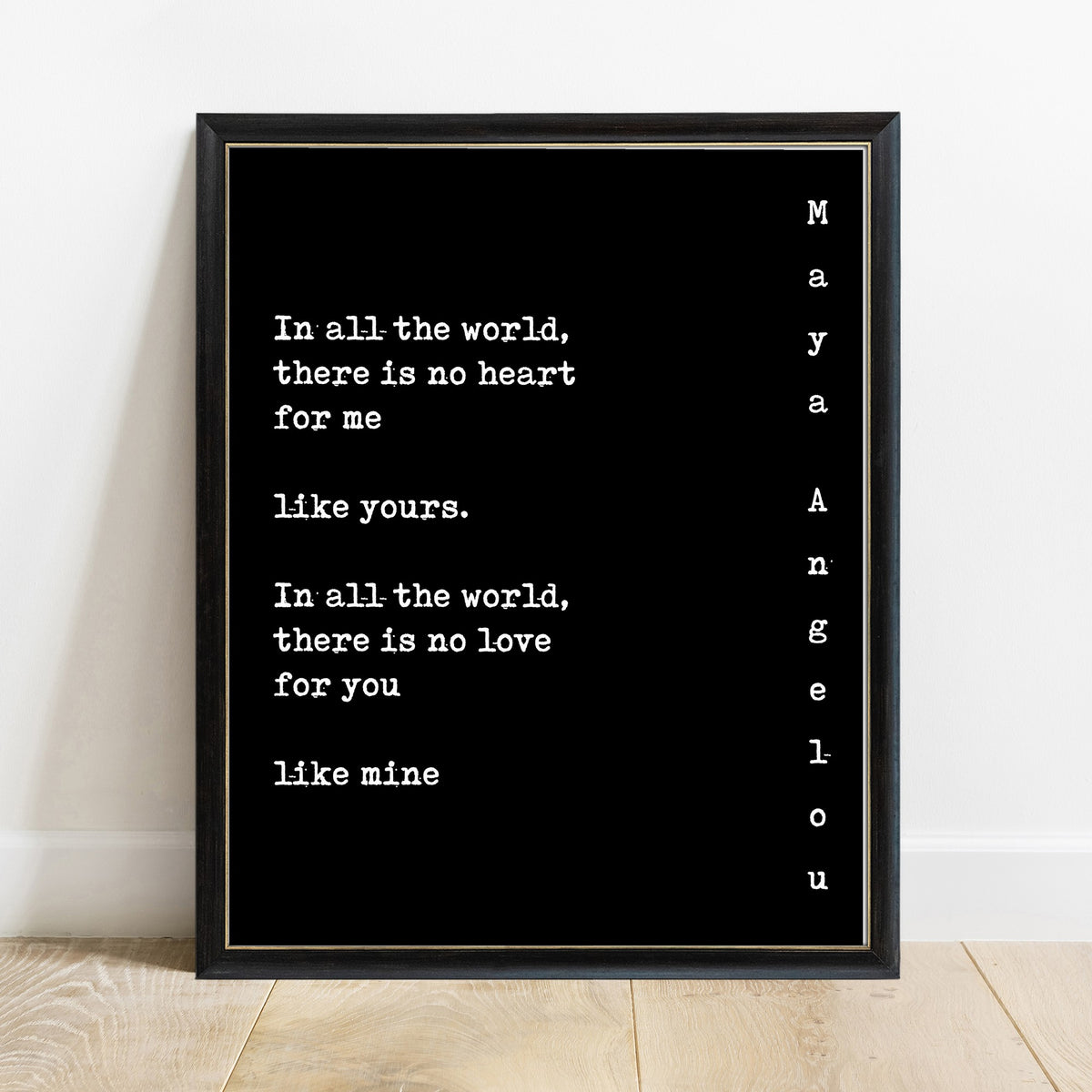 Maya Angelou in all the world there is no heart for me like yours print in a black frame, black background