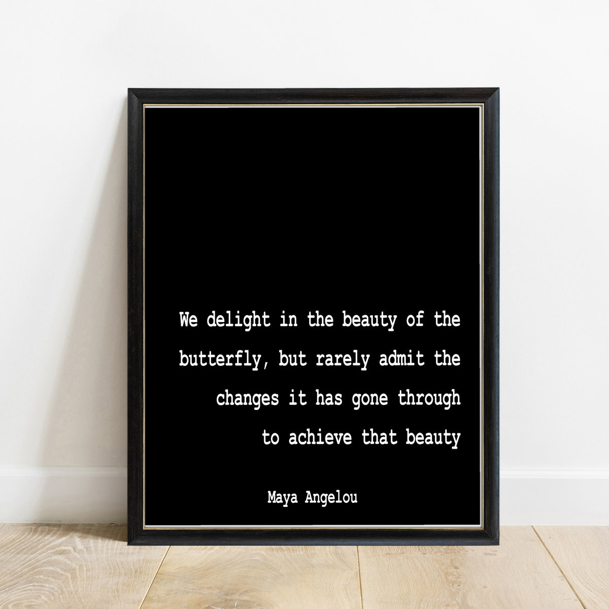 Maya Angelou We Delight In The Beauty Of The Butterfly quote print, black background, black frame