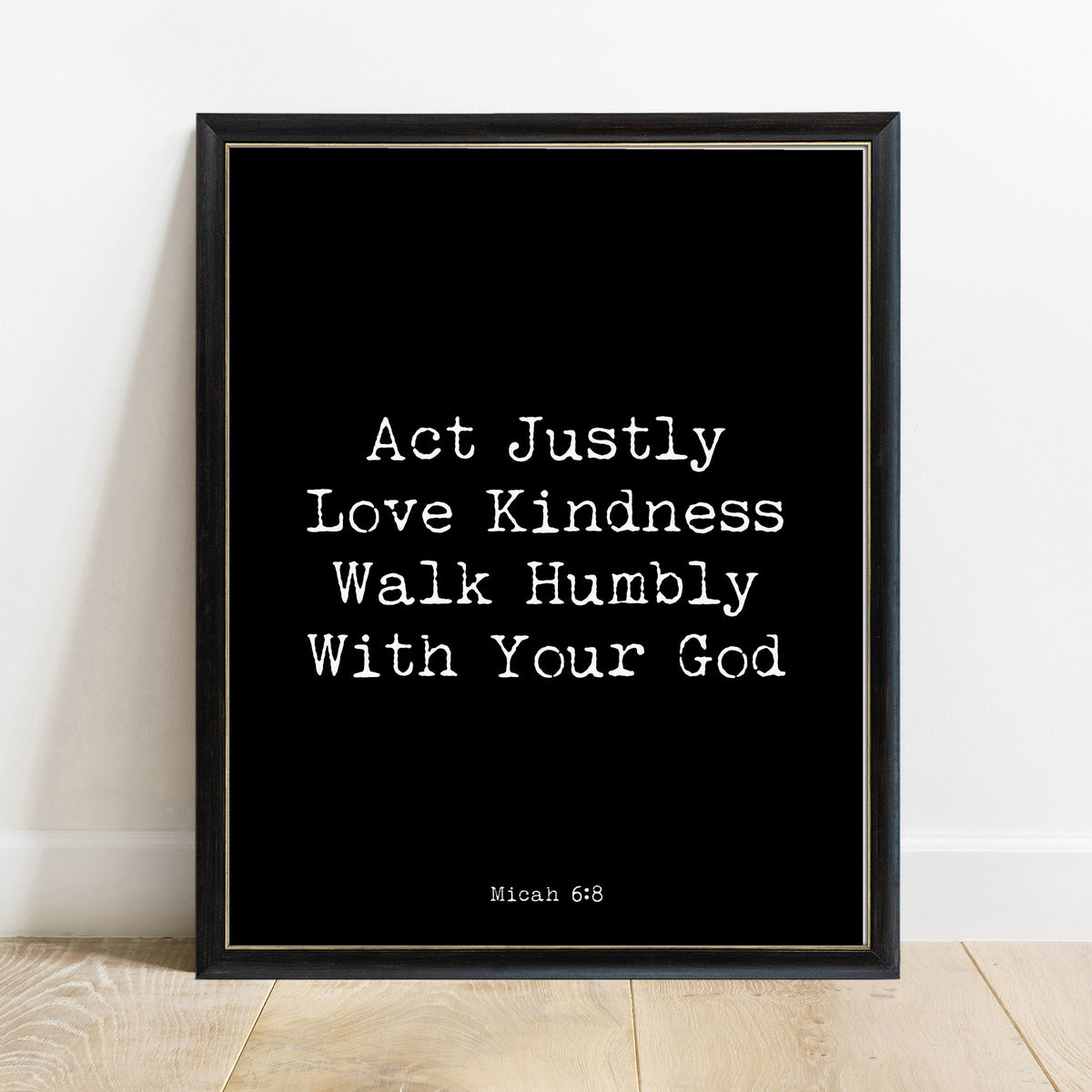 Micah 6:8 act justly love kindness scripture print in a black frame, black background