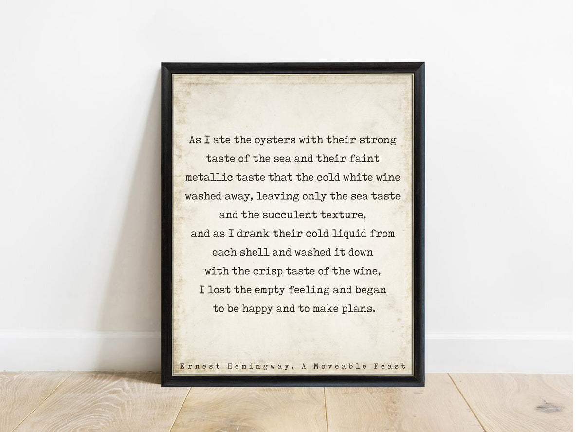 Ernest Hemingway A Moveable Feast oysters and cold white wine typewriter quote print in a black frame, vintage background