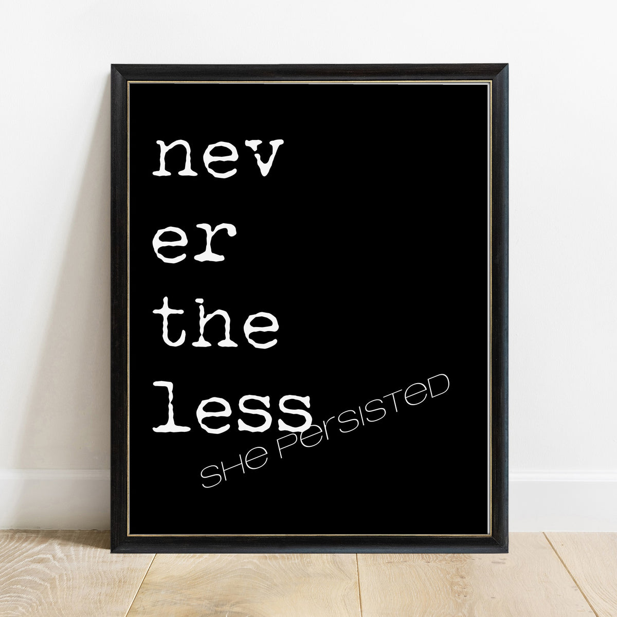 Nevertheless she persisted quote print in a black frame, black background