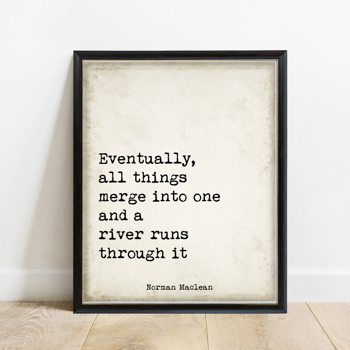 Norman Maclean Eventually All Things Merge Into One print in a black frame, vintage background
