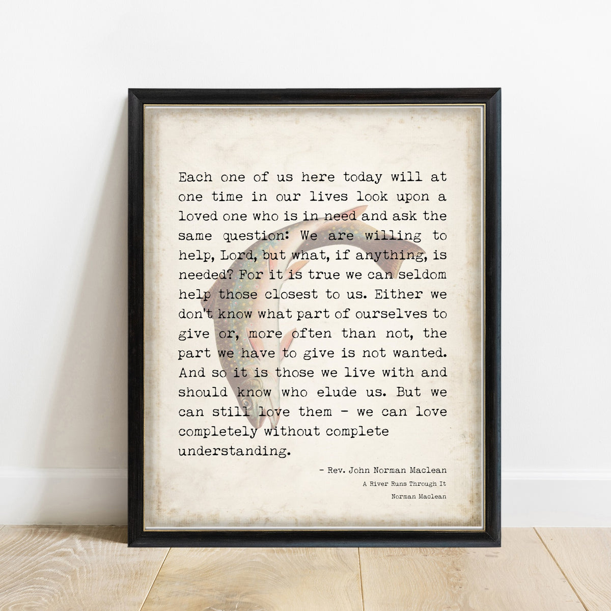 Norman Maclean Each One Of Us Here Today print with faded fish illustration in a black frame