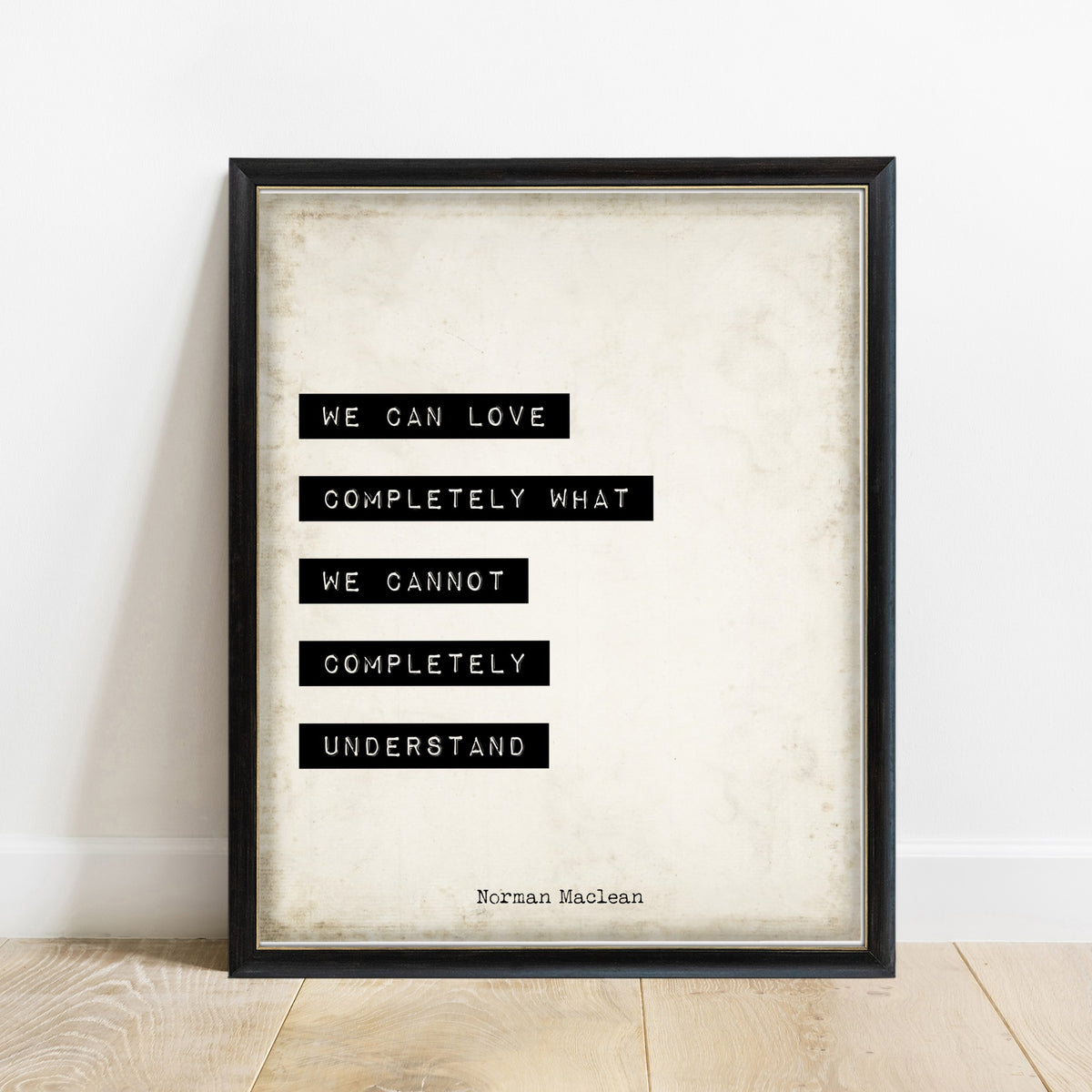 Norman Maclean We Can Love Completely print in a black frame, vintage background