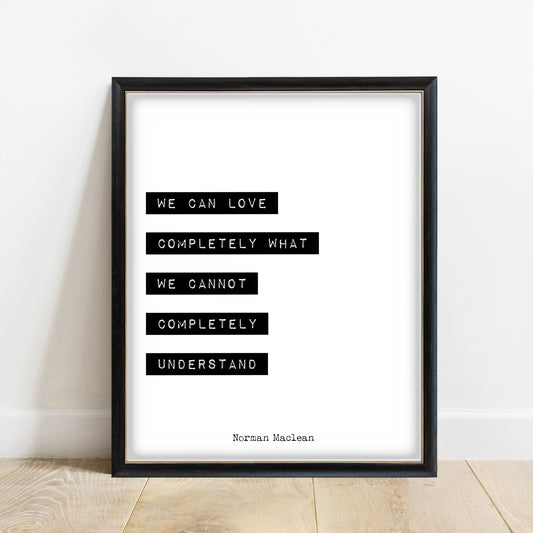 Norman Maclean We Can Love Completely print in a black frame, white background
