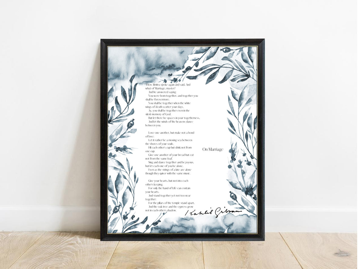 Kahlil Gibran On Marriage poem print with a blue-grey watercolour leaf border, in a black frame