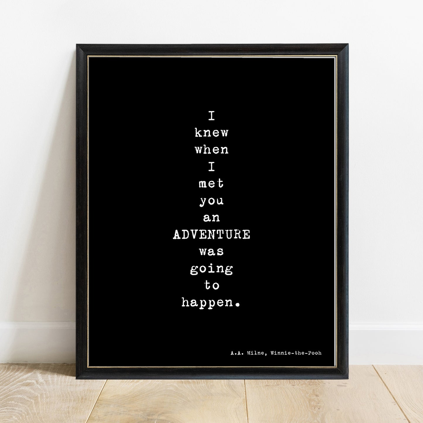Winnie the Pooh adventure quote print in a black frame, black background