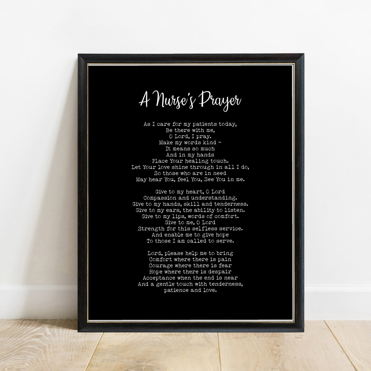 Nurse's Prayer print in a black frame, black background