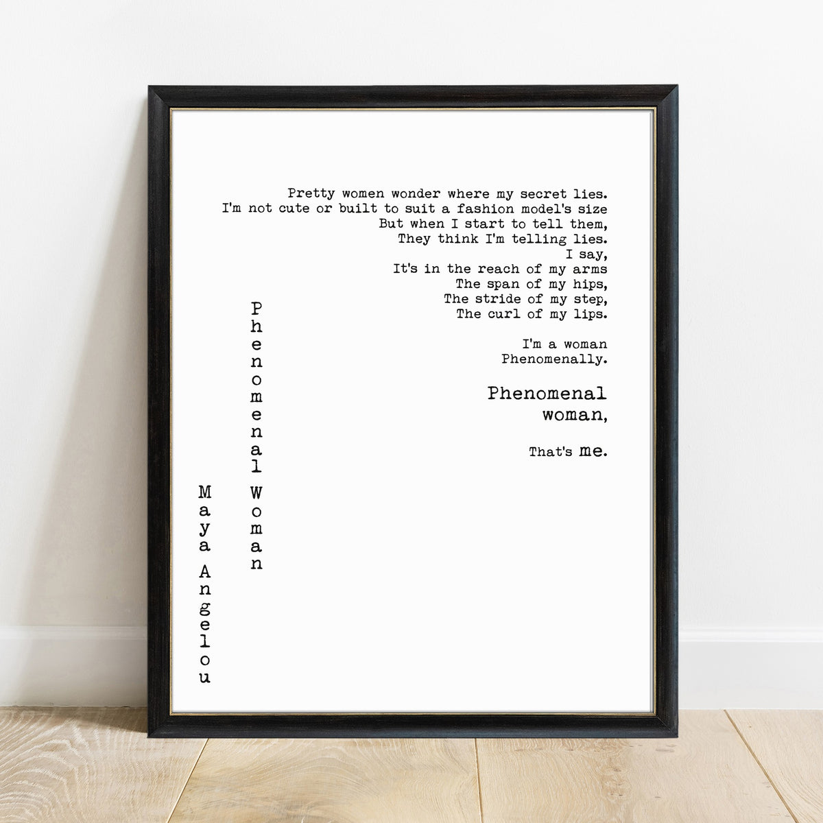 Maya Angelou Phenomenal Woman full poem print in a black frame, white background