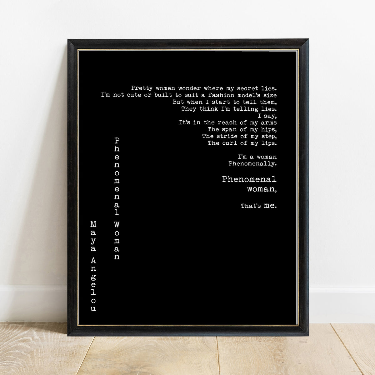 Maya Angelou Phenomenal Woman full poem print in a black frame, black background