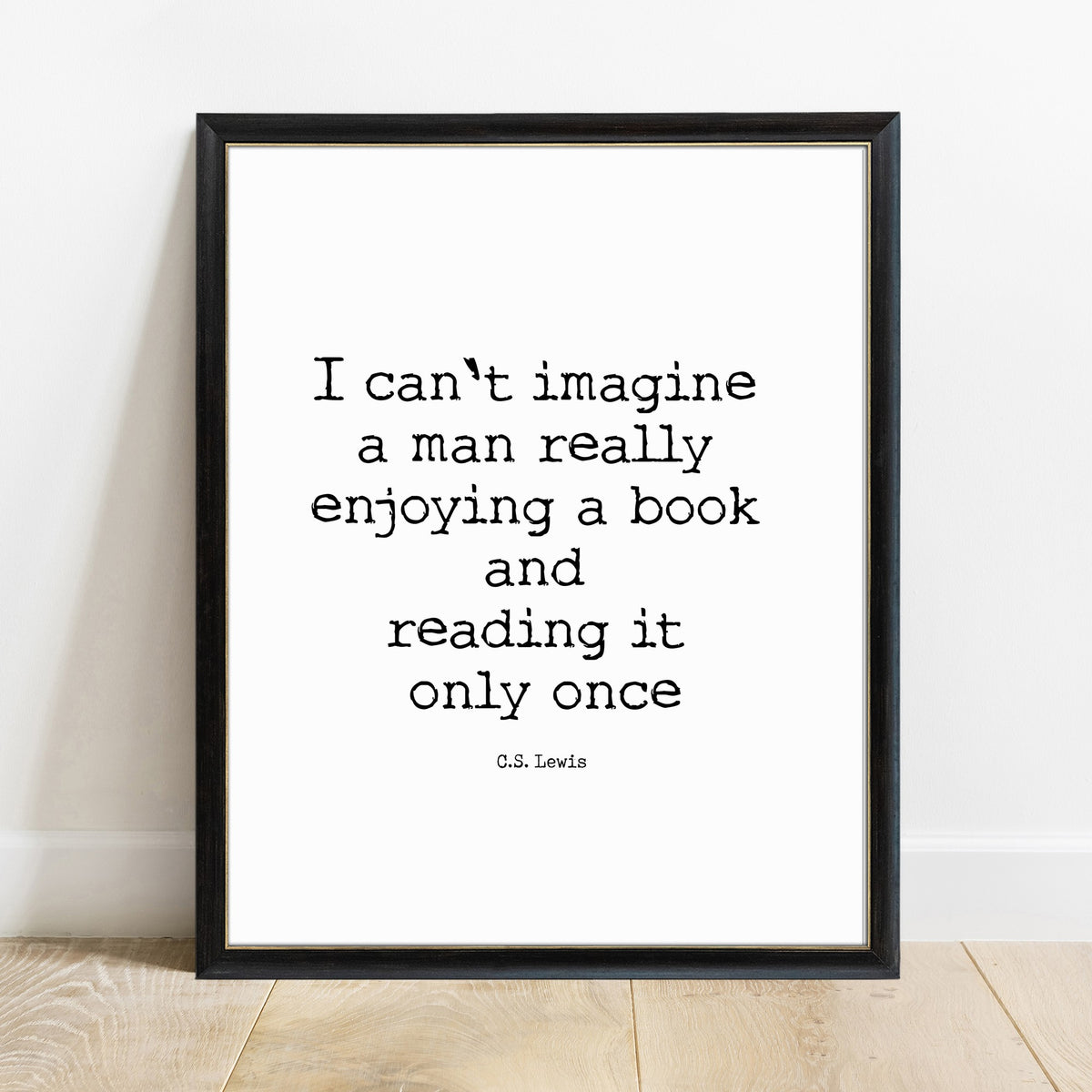 C.S. Lewis reading a book only once quote print in a black frame, white background