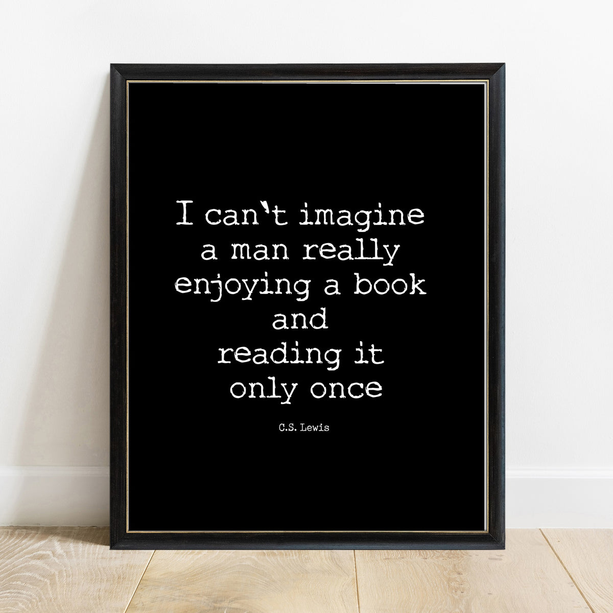 C.S. Lewis reading a book only once quote print in a black frame, black background