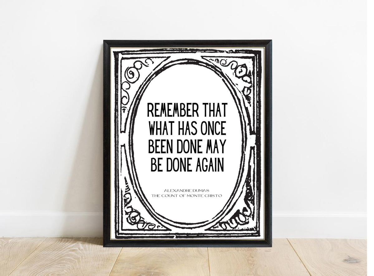 Alexandre Dumas Remember That What Has Once Been Done quote print in a black frame, white background