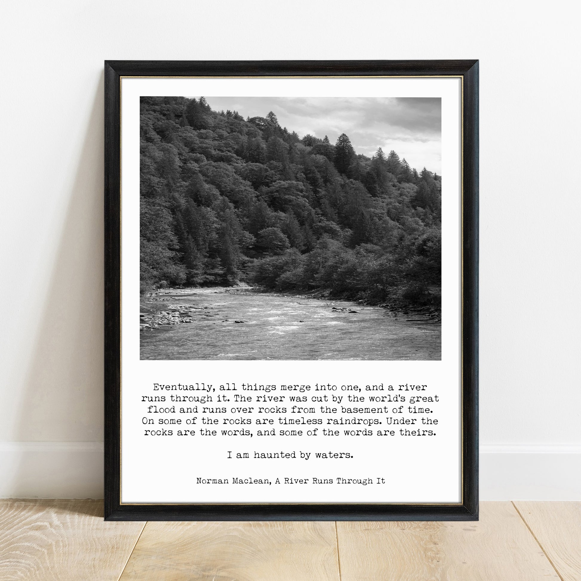 A River Runs Through It Norman Maclean quote print in a black frame