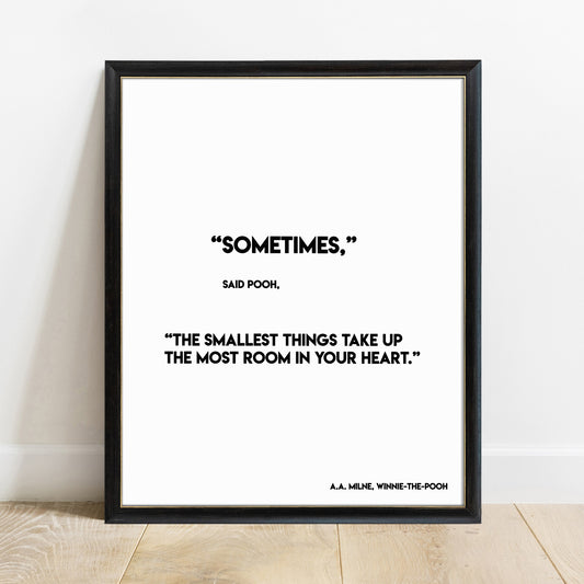 Winnie the Pooh smallest things quote print in a black frame, white background
