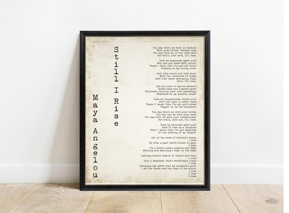 Maya Angelou Still I Rise poem print in a black frame, vintage background