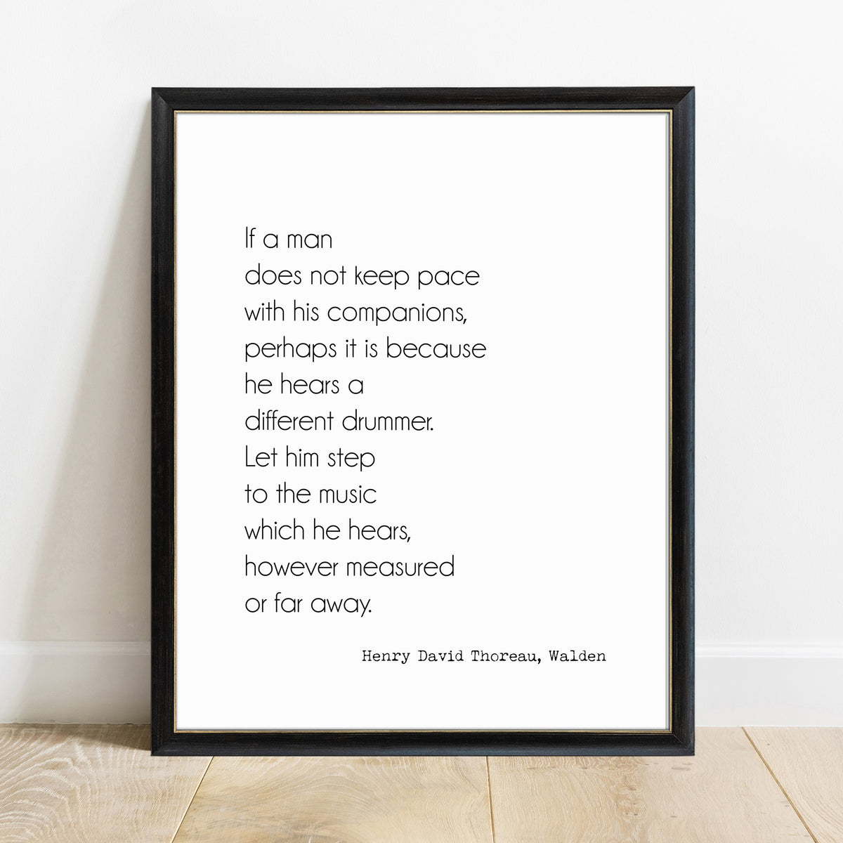 Thoreau different drummer quote print in a black frame, white background