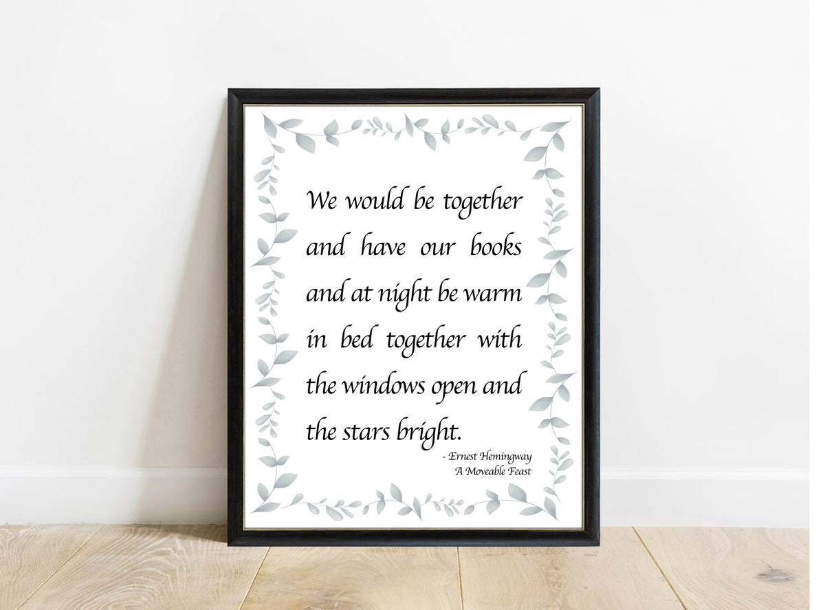 Ernest Hemingway we would be together script quote print with leafy border in a black frame, white background