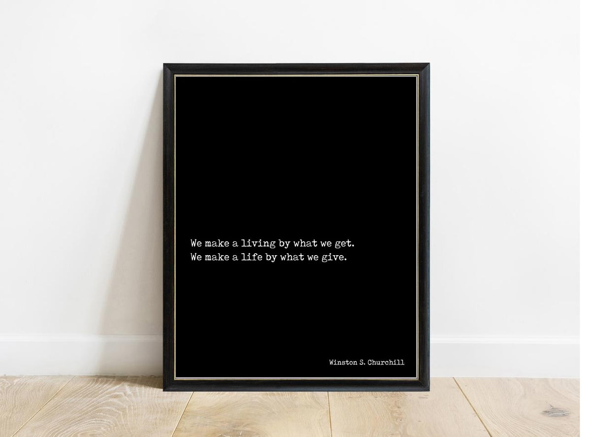 Winston Churchill We Make A Life By What We Give print in a black frame, black background