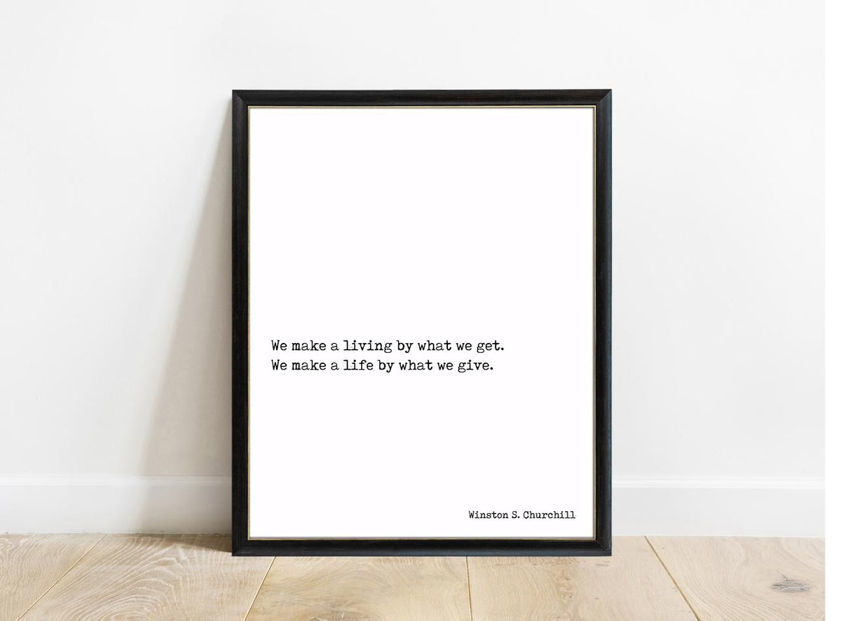 Winston Churchill We Make A Life By What We Give print in a black frame, white background