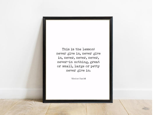 Winston Churchill This Is The Lesson Never Give In print in a black frame, white background
